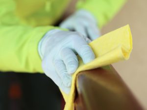 cleaning wooden rail