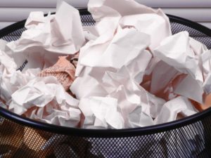 Waste basket with paper and recyclables